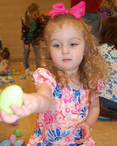 Girl showing Easter egg