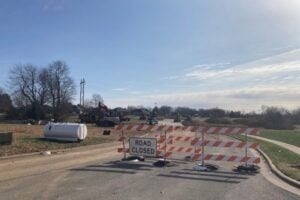 Road closed and construction equipment