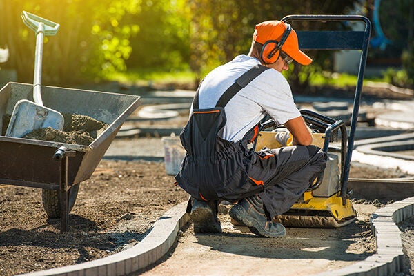 Man Paves Brick