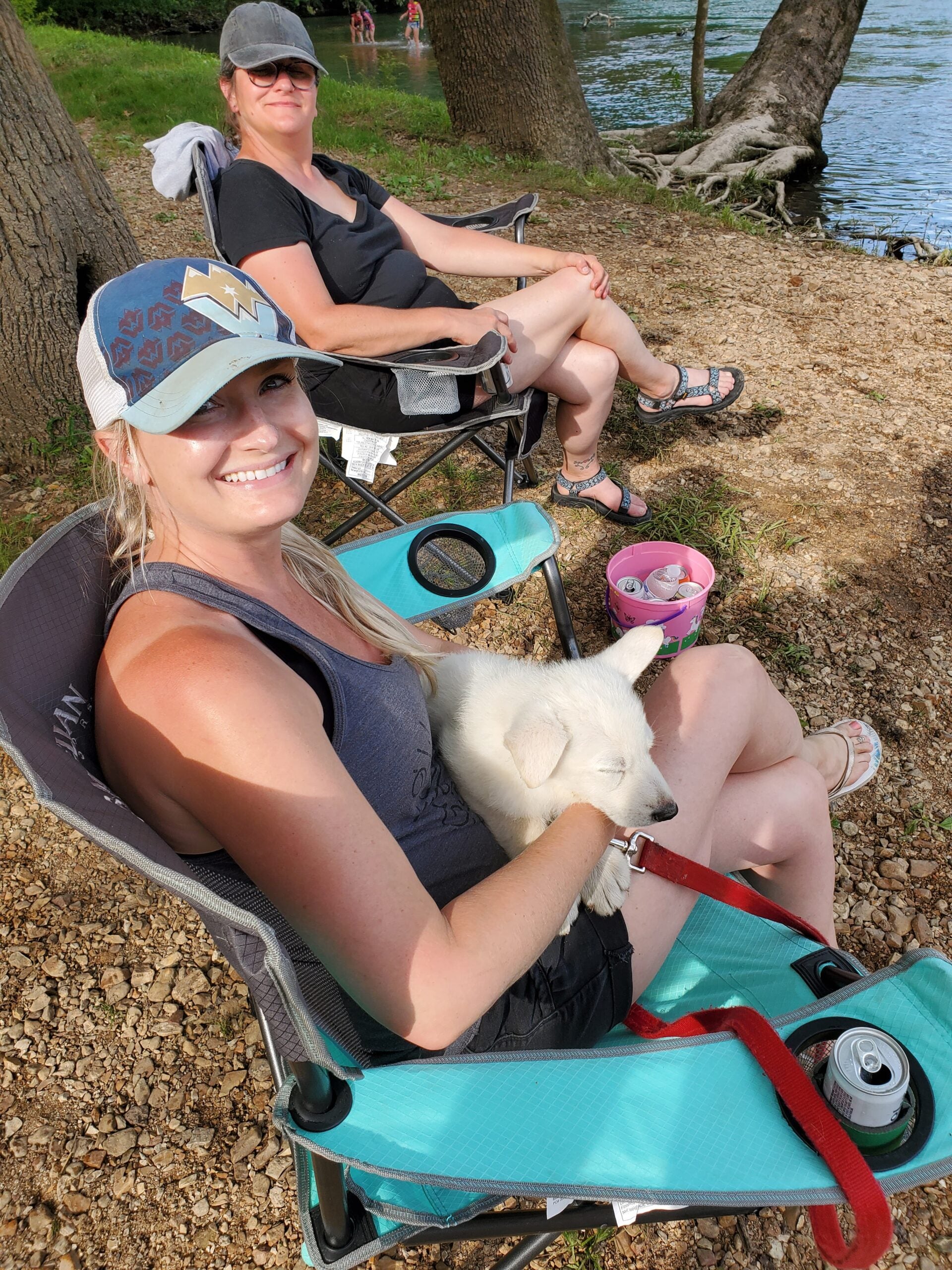 woman and dog at the lake