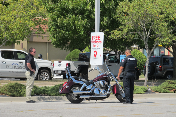 Two officers and a motercycle