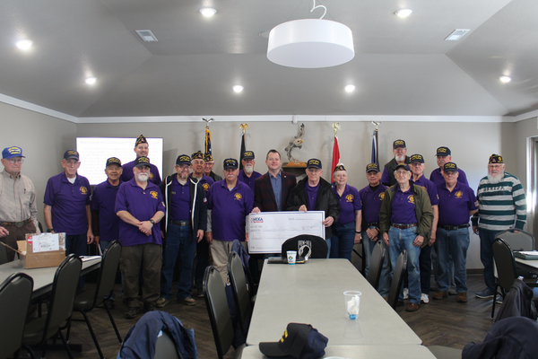 Members of the American Legion in Nixa accepting a check award